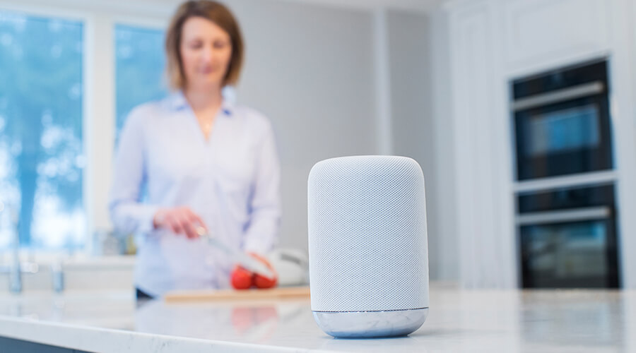 woman cooking with smart appliance