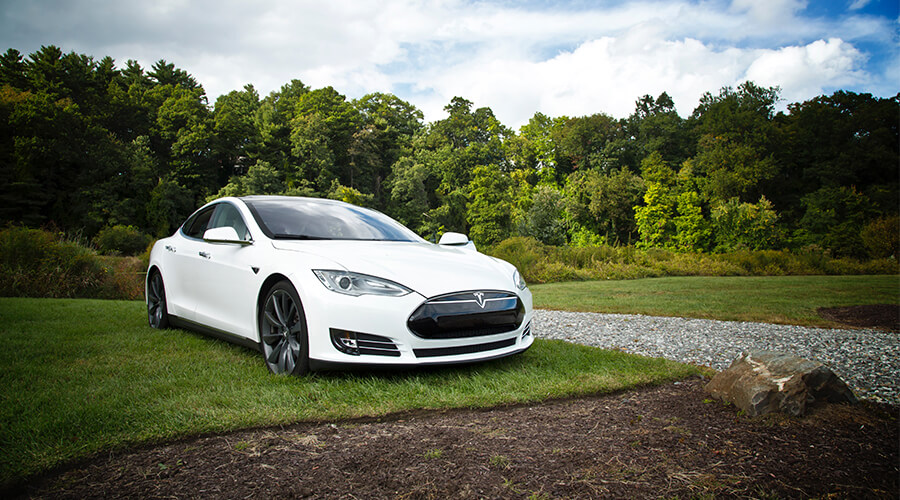 parked white tesla