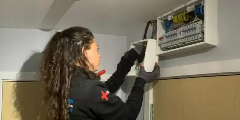 Electrician Checking Consumer Unit
