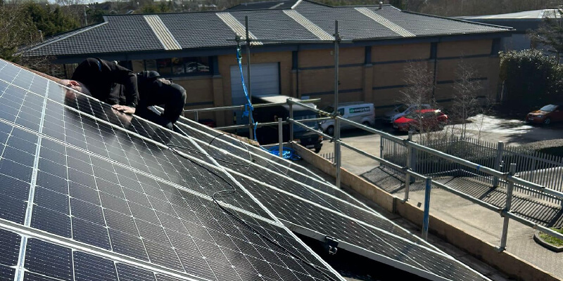 Worker Installing Panel