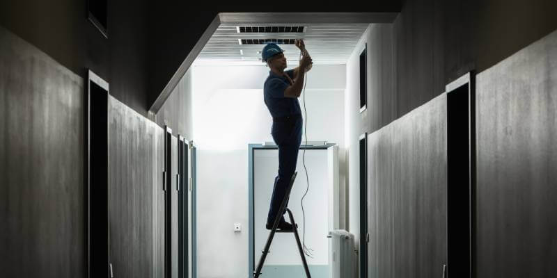 Electrician testing lighting